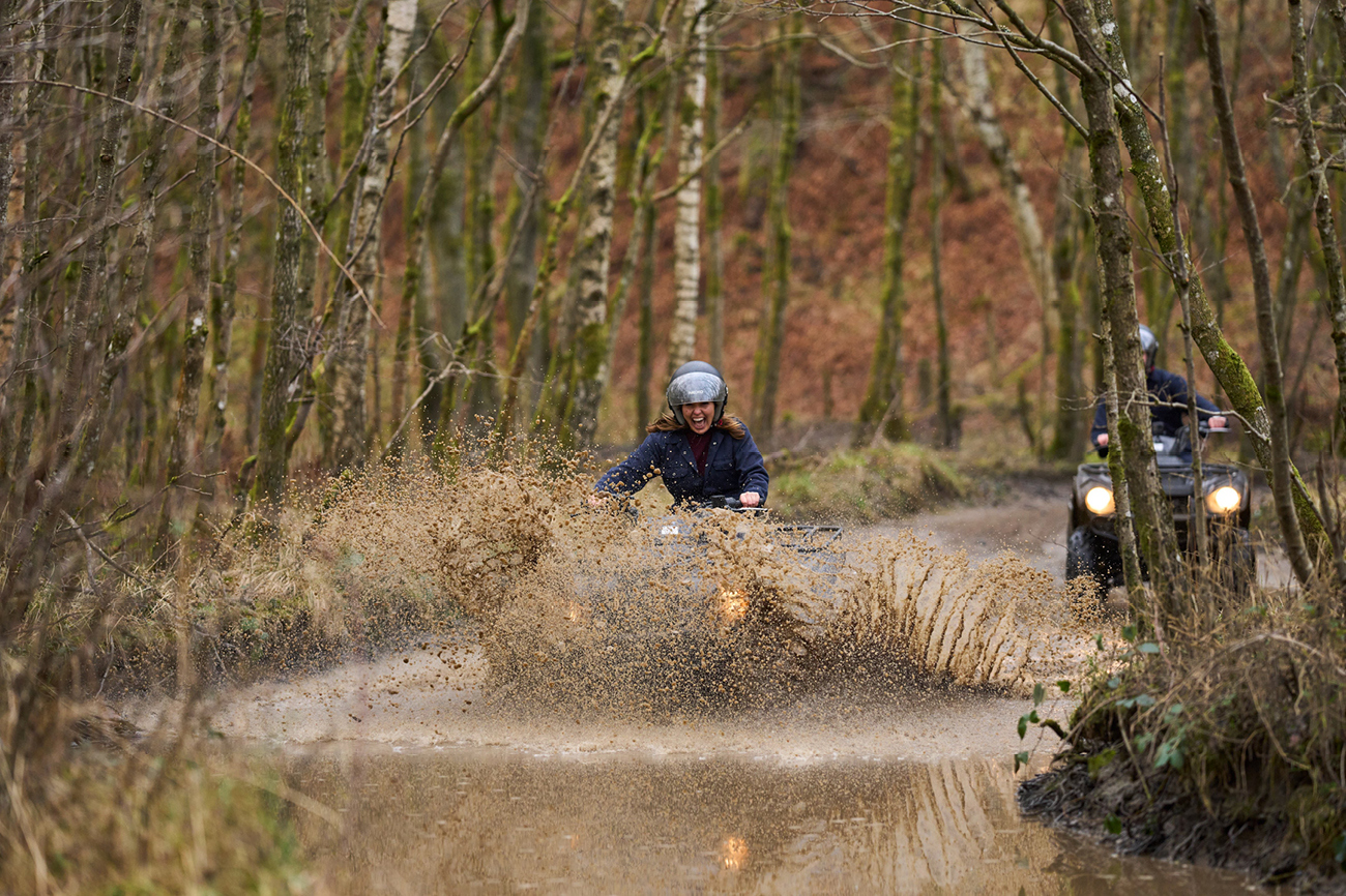 Quad Bikes driving through the estateat Action Glen Quad Bikes driving through the estateat Action Glen